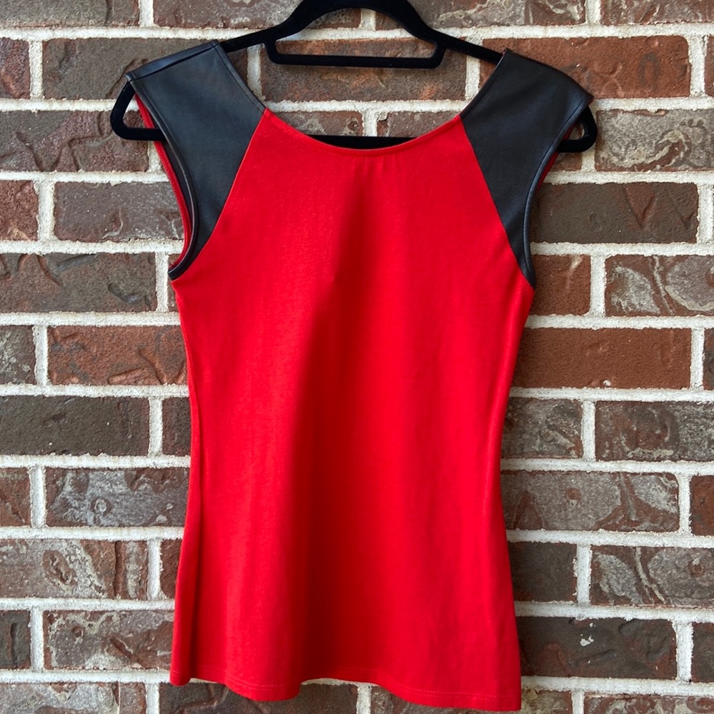 Express low back sleeveless women’s top. Vegan leather detail